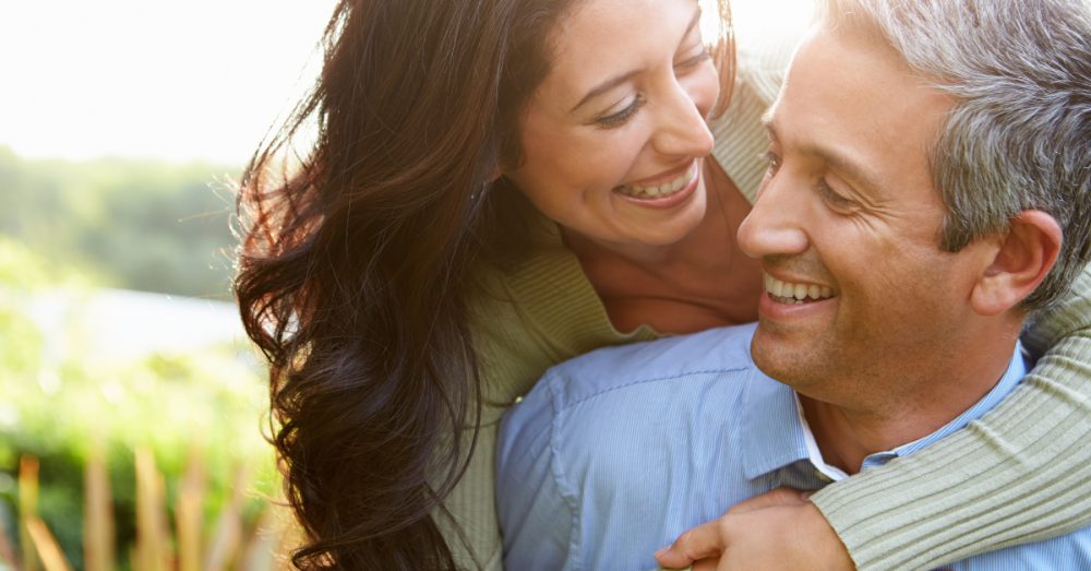 Couple smiling at each other